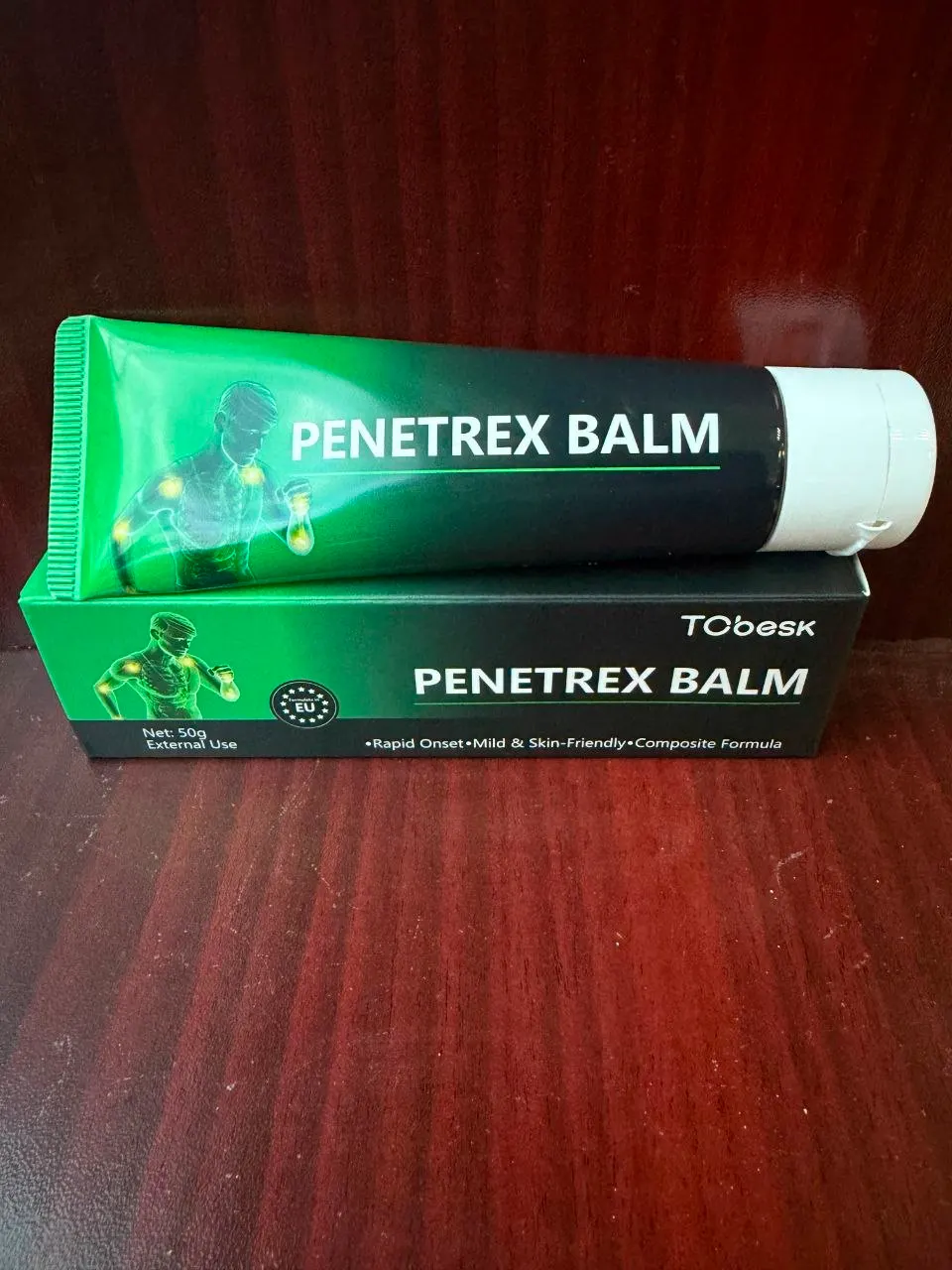 Penetrex Balm tube lying on its carton